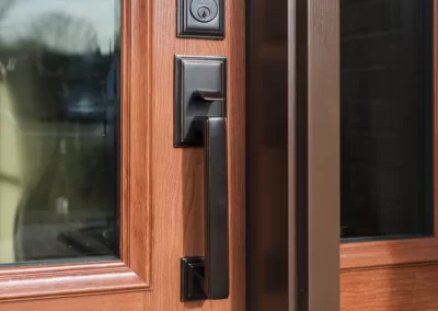 Entry Door Emtek Davos Grip Handle In Bronze Finish - SEVEN SUN CT - Windows and doors