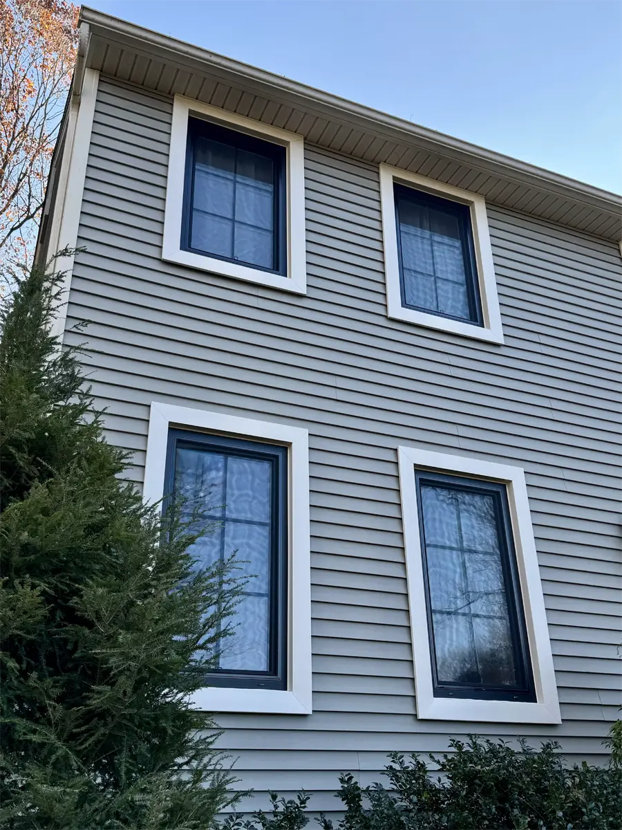 Black Tilt and turn windows installed in colonial home in connecticut Seven Sun CT
