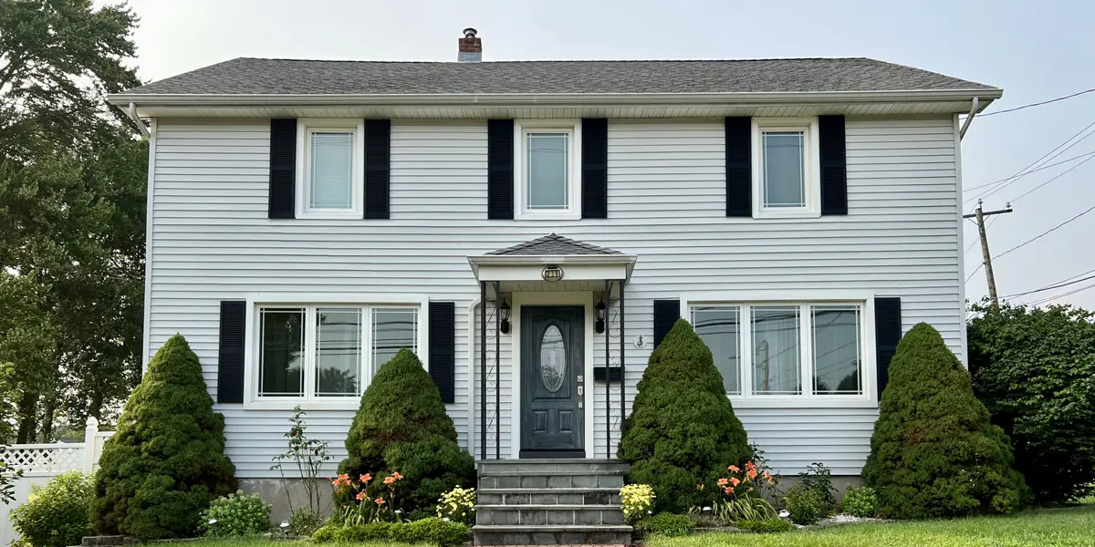 OKNA casement 700 series prairie grids provia signet front door blue glazed stain colonia home front view Seven Sun CT