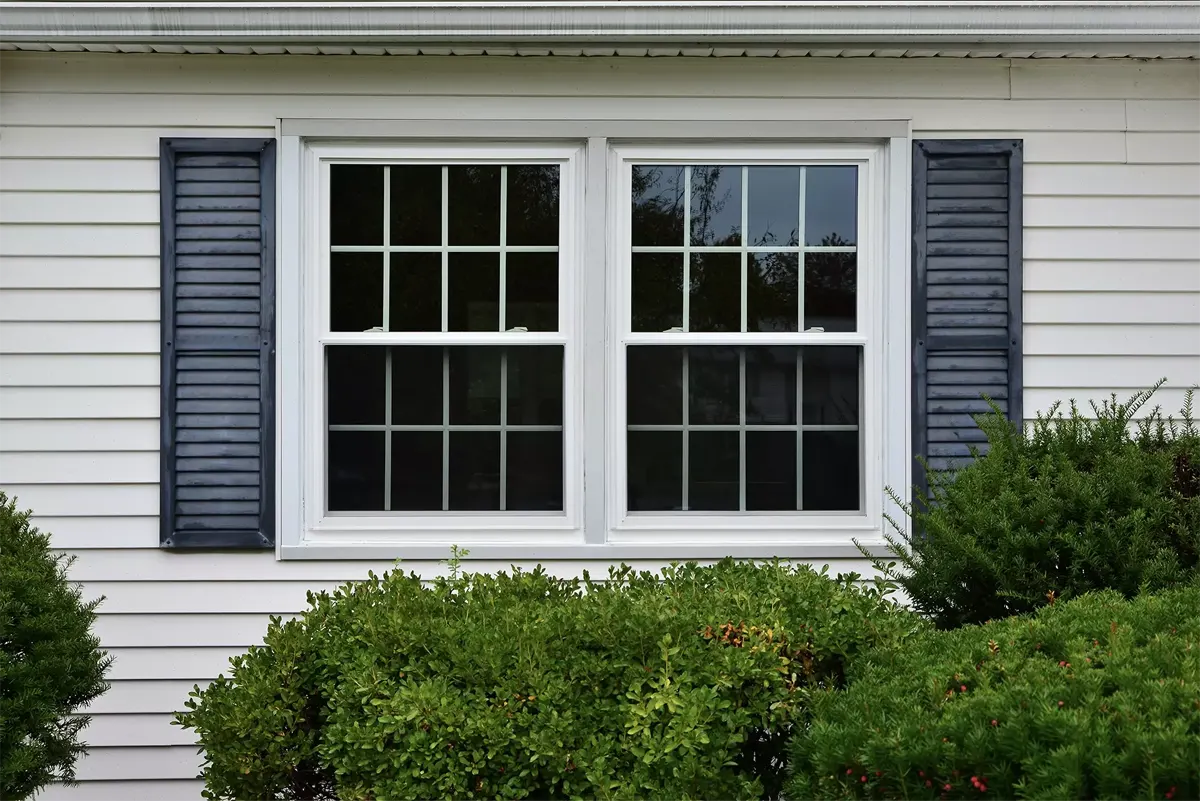 OKNA twin double-hung Enviro Star window with full colonial grids Seven Sun CT
