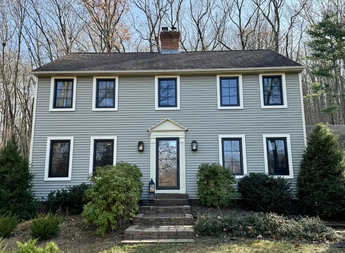 Colonial House with European Tilt and Turn Black Windows Seven Sun CT