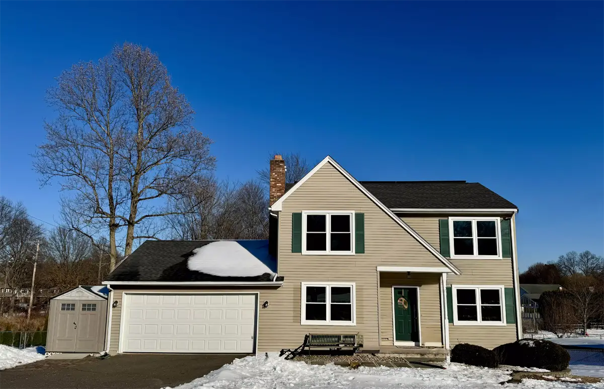 Okna envirostar 800 series replacement windows white exterior no grids clay siding green shutters colonial home Seven Sun Connecticut