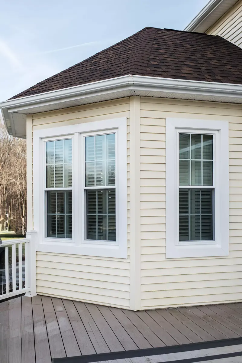 OKNA double hung windows with ful colonial grids and exterior trim Seven Sun CT