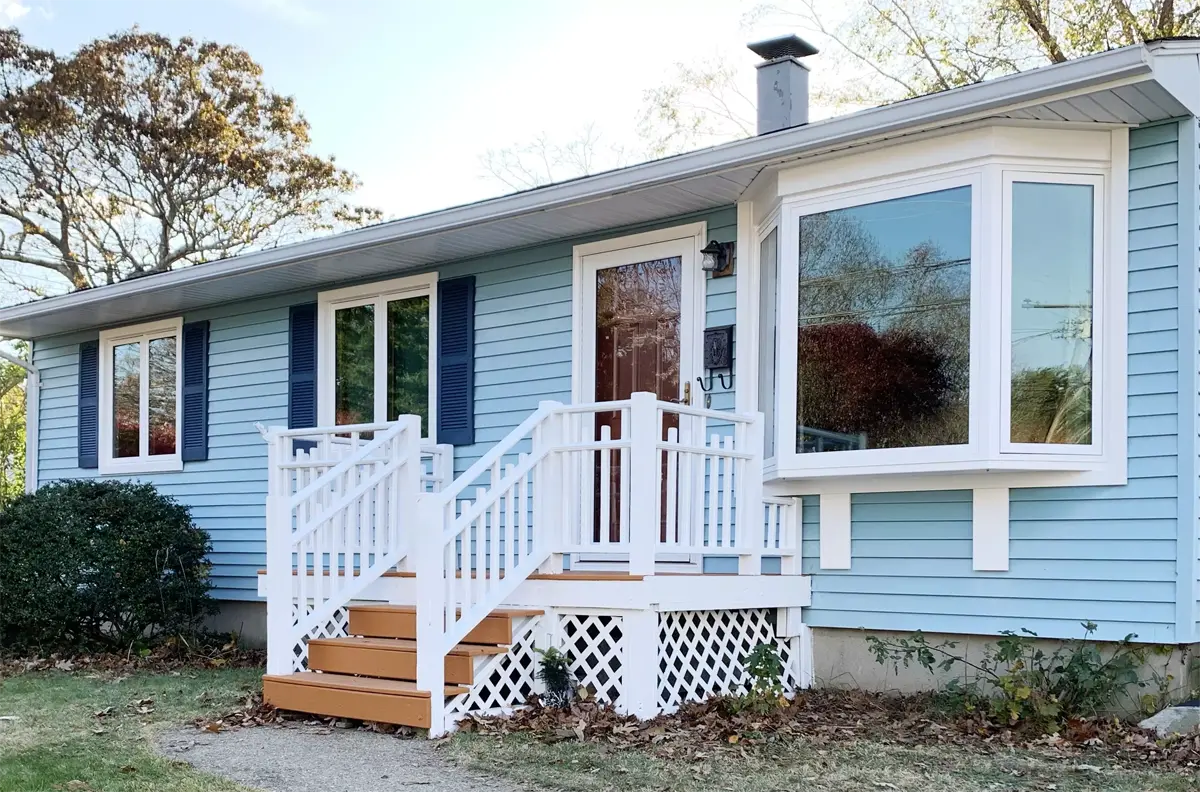 Okna casement 700 bay windows Provia signet entry door cape house front view Seven Sun CT