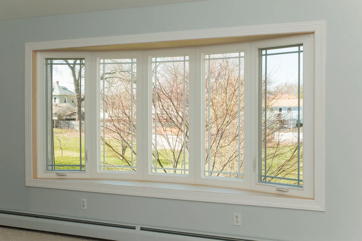 Living room window - 5-lite bow window, single prairie grids CT