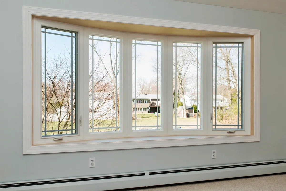Living room window - 5-lite bow window, single prairie grids CT