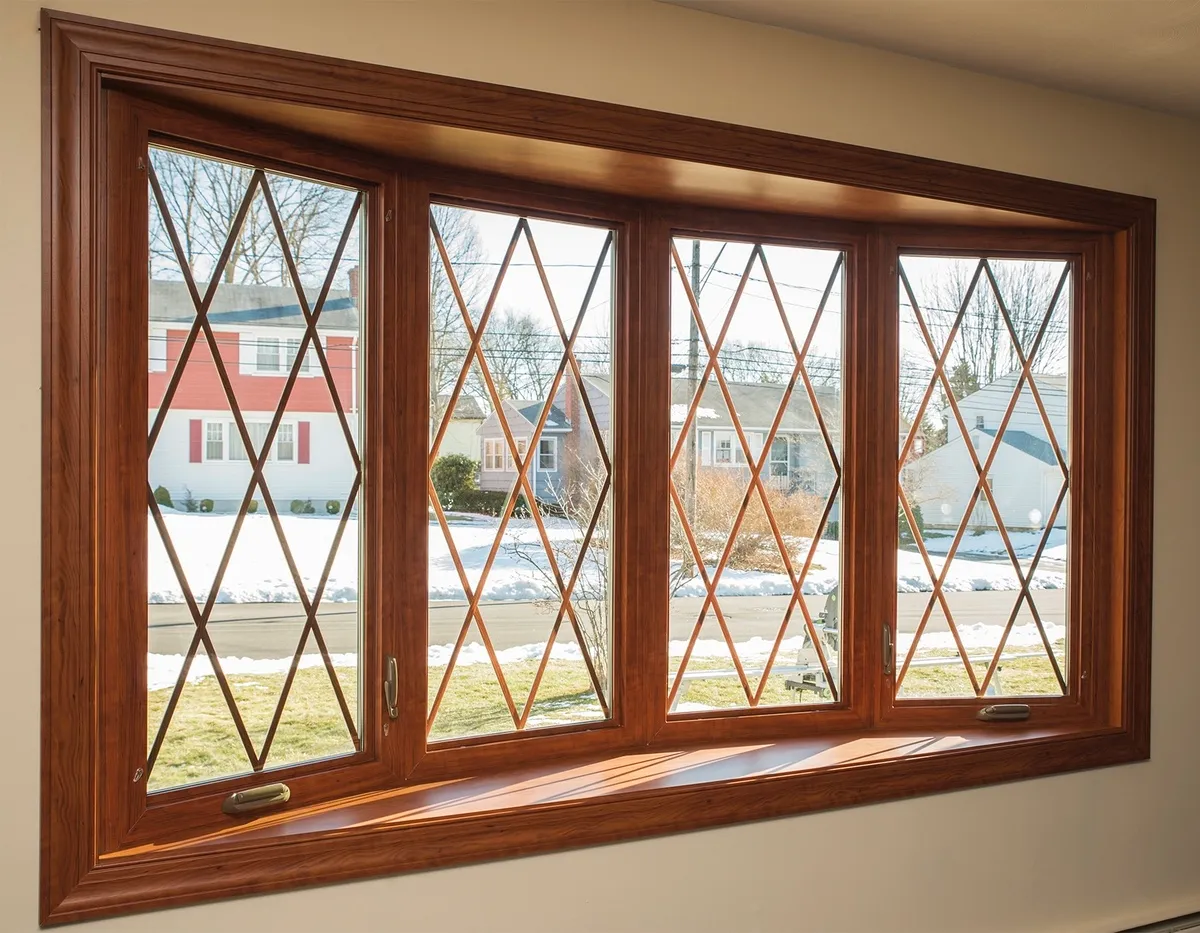 Living room window - bow window, diamond grids, melrose cherry - Okna CT